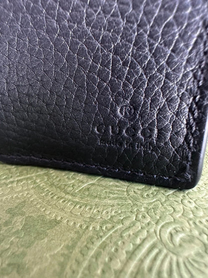 Gucci Jumbo GG Embossed Black Leather Bifold Wallet